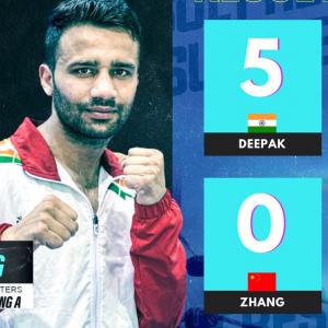 Boxers Deepak, Nishant dominate; move into quarters