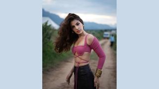 Rhea Dresses Up To Impress