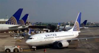 Indian held in US for sexually assaulting fellow passenger on plane