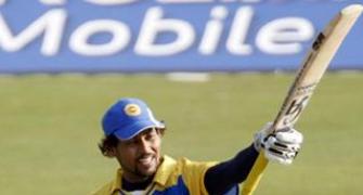 Dilshan hundred as Lanka win rain-marred opener