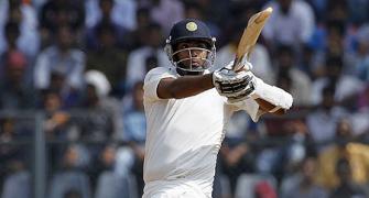 PHOTOS: Ashwin scores half-century to delay inevitable
