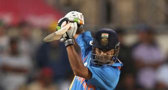 PHOTOS: Dhoni takes India home after Gambhir heroics