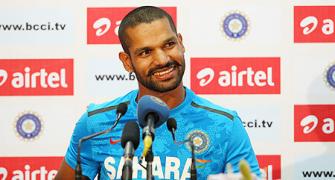 Dhawan takes charge after Smith, Starc rescue act