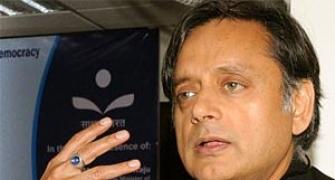 Scolded by Sonia, Tharoor gets pat on the back from Modi