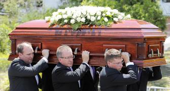 Australia's final goodbye to Hughes in hometown funeral