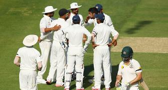 PHOTOS, Day 1: India strike late after Warner slams century