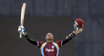 Samuels fires hundred as crisis-hit Windies stun World champs India