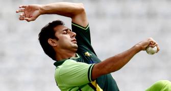 Ajmal vows to return with clean action, eyes 2015 World Cup