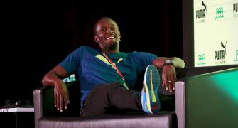 Bolt refuses to see himself as savior of dope-tainted athletics
