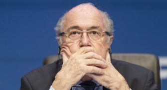 What prompted outgoing FIFA chief Blatter to quit?