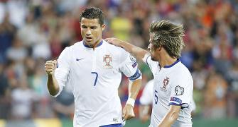 Euro qualifiers PHOTOS: Ronaldo tricks for 10-man Portugal; Germany win