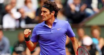 New racquet-wielding Federer says never felt better before Wimbledon