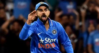 PHOTOS: Kohli, spinners secure India's T20 win against Australia