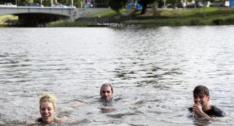 Kerber dives into Yarra river to celebrate Aus Open triumph