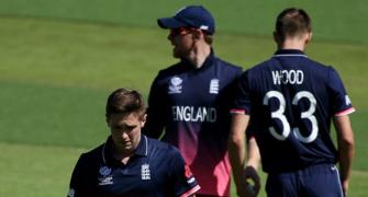 Woakes out of Champions Trophy with side strain