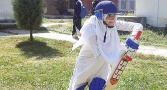 Kashmir's women cricketers pitch for equality -- in burqas and hijabs