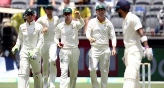Kohli hits century but Australia on top
