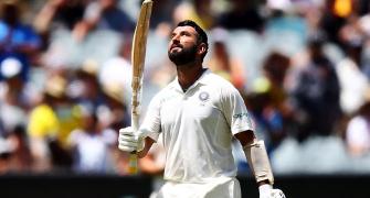 PHOTOS: Pujara hits century as India's batsmen dominate