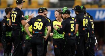 PHOTOS: Australia outclass India in rain-hit T20 match
