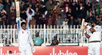 Pakistan's Abid, Azam hit tons to brighten drawn Test