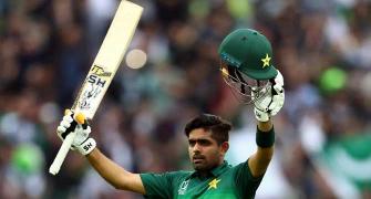 PIX: Azam's ton helps Pakistan down NZ to stay alive