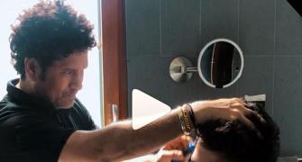 SEE: Sachin gives son Arjun a haircut