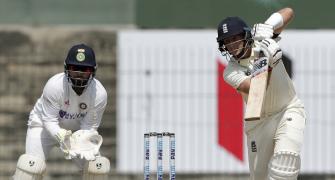 Root marks milestone with ton on Day 1