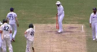Rohit shadow bats as Smith watches