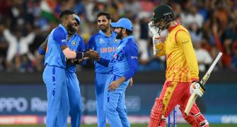 PIX: India thump Zimbabwe; face England in semis