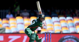 PIX: Bangladesh pip Zimbabwe after chaotic final over