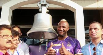 Russell rings the iconic bell at Eden Gardens