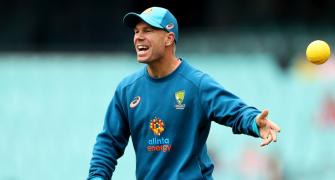 Warner laughs off early retirement talks