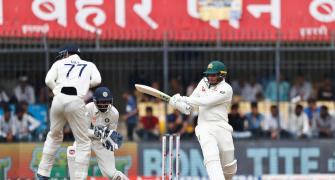 Spinners, Khawaja take honours on Day 1 at Indore