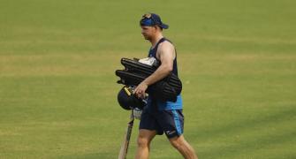 Glenn Phillips seen applying saliva on ball