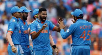 Captain Rohit doffs his hat to the Indian bowlers