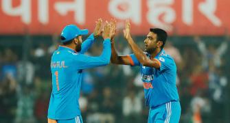 PIX: India crush Aus by 99 runs in rain-shortened tie