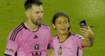 Teenager Invades Pitch To Meet Messi