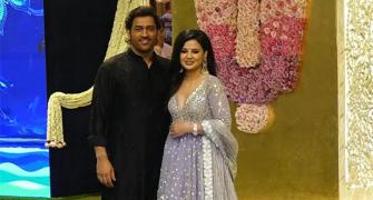Mr & Mrs Dhoni steal show at Ambani's Pooja ceremony