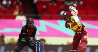 T20 WC PIX: Bau hits 50, WI restrict PNG to 136/8