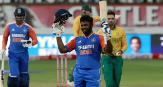 Samson's record century powers India to huge score