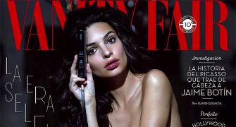 Emily Ratajkowski strips for mag cover