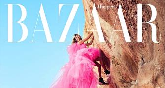 OMG! Julia Roberts climbs a rock in a gown