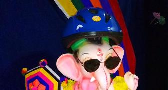 So cute! Ganesha wears a helmet