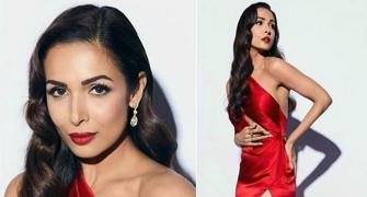 Oomphalicious! Malaika stuns in a figure-hugging gown