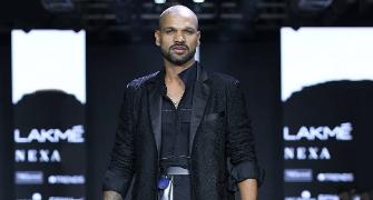 Shikhar Dhawan walks the ramp at Lakme Fashion Week
