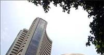 Sensex slips 256 points on global cues