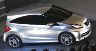 Honda unveils small concept car, launch in 2011