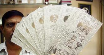 Rupee gains further, up 14 paise vs USD