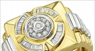 Gold climbs on jewellers' buying, overseas cues