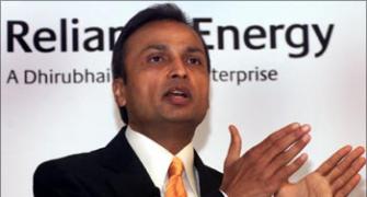 Anil Ambani, 2 firms barred from markets till 2012